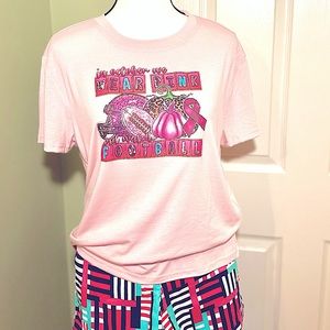In Oct We Wear Pink And Watch Football Graphic Breast Cancer Pink T-Shirt🩷